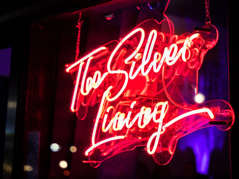 A neon sign greets guests upon entry at the The Silver Lining piano bar on 16th Street in Sacramento.
