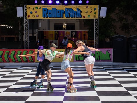 Roller girls enjoy opening day at the new Downtown Sacramento Roller rink on June 28.