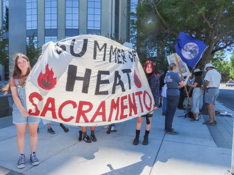 Local climate justice and faith organizations gather Saturday, Aug. 17, 2024, in downtown Sacramento for a demonstration to hold Wall Street accountable for financing fossil fuels.