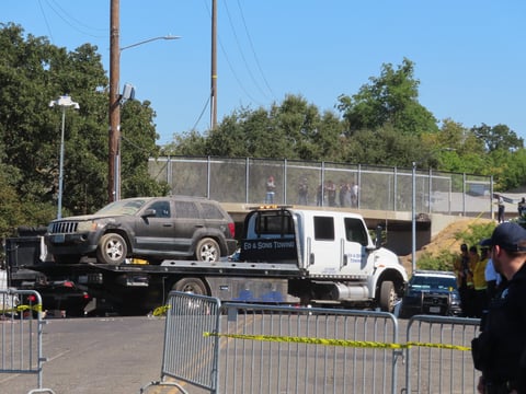 A Jeep Grand Cherokee gets towed from Camp Resolution on Monday, Aug. 26, 2024, in Sacramento.