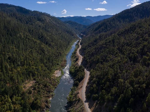 The Klamath River winds runs along Highway 96 on June 7, 2021, near Happy Camp, Calif.