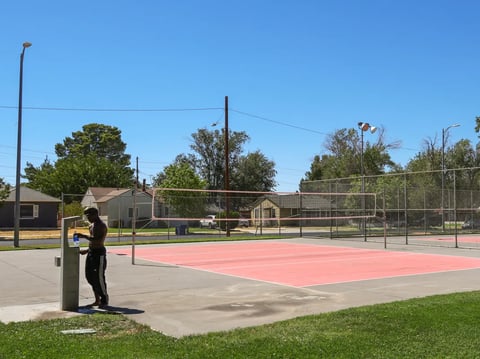 A tennis court is almost empty in Lancaster, where ground surface temperatures reached 150 degrees on Aug. 15, 2024. Lancaster is among California cities projected to have a fast-growing population and more than 25 high heat days a year by 2050.
