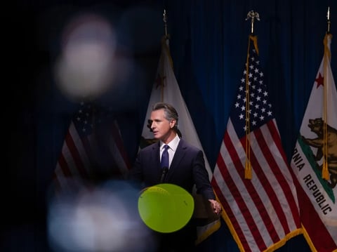 Gov. Gavin Newsom addresses the media during a press conference unveiling his 2024-25 January budget proposal at the Secretary of State Auditorium in Sacramento on Jan. 10, 2024.