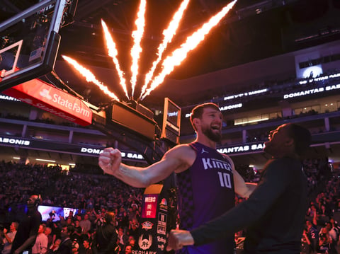 Sacramento Kings center Domantas Sabonis (10) gestures before the team's NBA basketball game against the Phoenix Suns on Friday, April 12, 2024, in Sacramento, Calif. The Suns won 108-107.