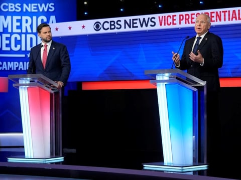 Republican vice presidential nominee Sen. JD Vance of Ohio and Democratic vice presidential nominee Minnesota Gov. Tim Walz participate in a debate hosted by CBS News on Tuesday in New York.