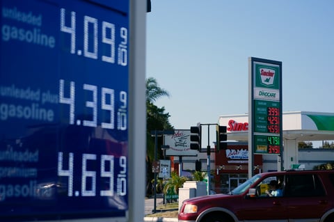 A sign at a Sinclair gas station is seen next to an Arco gas station advertising gasoline prices, June 10, 2024, in Long Beach, Calif.
