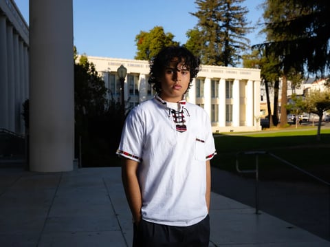 Senior student Daniel Alfaro, whose parents immigrated from Mexico and El Salvador, at Oakland Technical High School on Oct. 8, 2024. Alfaro is working to get into a prestigious college to study biotechnology or kinesiology.