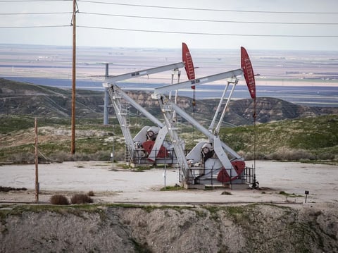 Oil pumps near a power plant along Elk Hills Road. The Elk Hills oil and gas field and power plant will be the site of a planned carbon capture project that stores carbon dioxide underground.