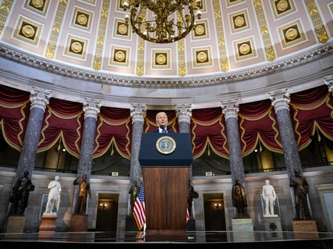 President Joe Biden speaks from Statuary Hall at the U.S. Capitol to mark the one year anniversary of the Jan. 6 riot at the U.S. Capitol by supporters loyal to then-President Donald Trump, Thursday, Jan. 6, 2022, in Washington.