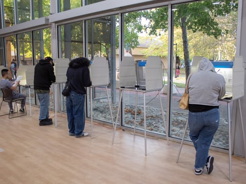 Sacramento residents fill out their ballots at a vote center in the Oak Park Community Center on Tuesday, Nov. 5, 2024.