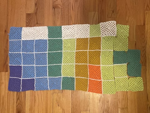 Crochet granny squares representing January through October average temperatures in Sacramento, produced as part of CapRadio's temperature blanket.