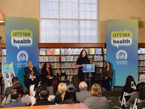 Jessica Altman, executive director of Covered California, speaks at the statewide “Let's Talk Health” campaign in Los Angeles on Nov. 13, 2024. She is promoting a new Affordable Care Act expansion that benefits immigrants with DACA protection.