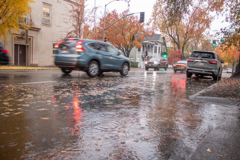 Cars drive by during a rain storm Friday, Nov. 22, 2024, in Sacramento.