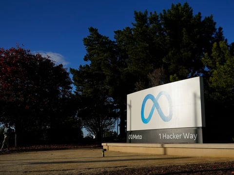 Meta's logo can be seen on a sign at the company's headquarters in Menlo Park, Calif., Wednesday, Nov. 9, 2022.