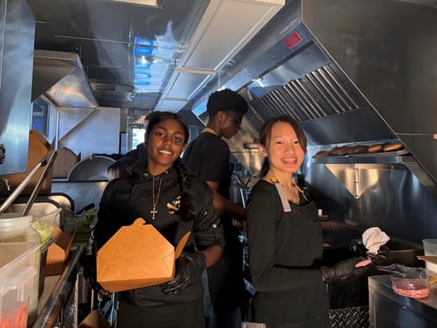 Rio Linda and Foothill High School students make hamburgers in Twin Rivers Unified School District's Career Technical Education food truck.