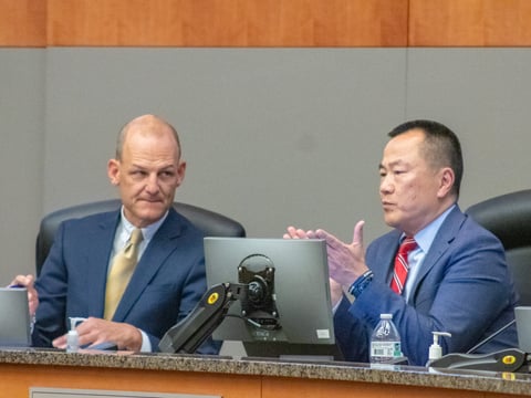 City Manager Howard Chan (right) sits at the dais next to Mayor Kevin McCarty Tuesday, Dec. 10, 2024, at Sacramento City hall.