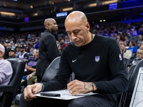 Sacramento Kings Interim Head Coach Doug Christie draws out a play before an NBA basketball game against the Dallas Mavericks Monday, Dec. 30, 2024, in Sacramento, Calif.