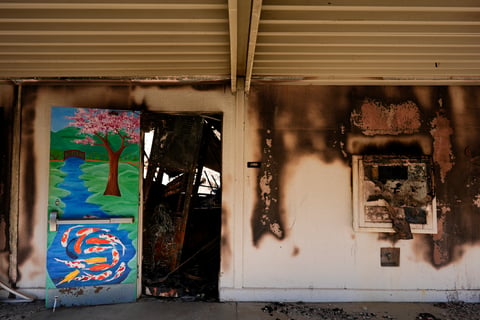 The entrance to a classroom is seen at Palisades High School in the aftermath of the Palisades Fire in the Pacific Palisades neighborhood of Los Angeles, Tuesday, Jan. 14, 2025.