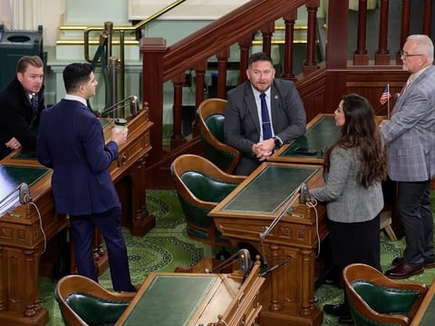 Left to right: Republican Assemblymembers Greg Wallis, Bill Essayli, Juan Alanis, Kate Sanchez and Tom Lackey talk before the start of a session at the state Capitol in Sacramento on Feb. 20, 2024.