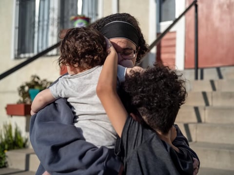 Loreal Duran with her children, ages one and seven, in front of her apartment complex in Los Angeles on Feb. 8, 2025. Loreal’s husband, Giovanni Duran, was born in El Salvador and detained by ICE agents in late January. He is still being held.