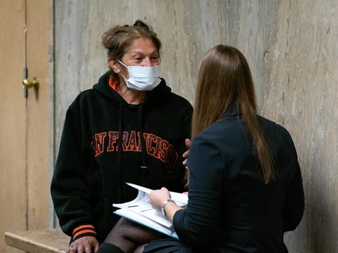 Linda Vazquez, 52, meets with San Francisco Public Defender, Samantha Perez, before her arraignment for ‘unlawful lodging’ at the Hall of Justice in San Francisco on Nov. 27, 2024.