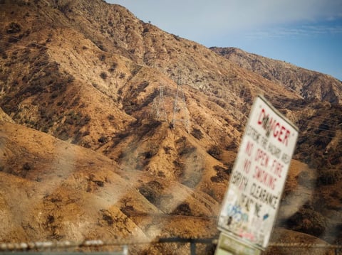 The electrical towers above Eaton Canyon in Altadena, where the LA wildfire known as the Eaton Fire originally started. Feb. 8, 2025.