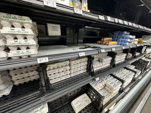 Cartons of eggs sit on a shelf in a Walmart store Monday, March 10, 2025, in Englewood, Colo.