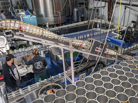 Canned wines on the packaging line at Tank Space in Sacramento. The Can Van does onsite packaging at the facility. (Photo courtesy of Jenn Coyle)