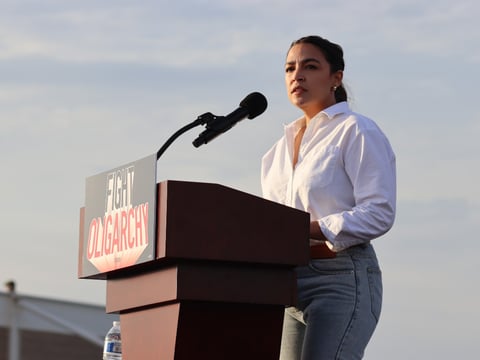 Representative Alexandria Ocasio-Cortez addresses the crowd at Folsom Lake College on Tuesday, April 15, 2025.