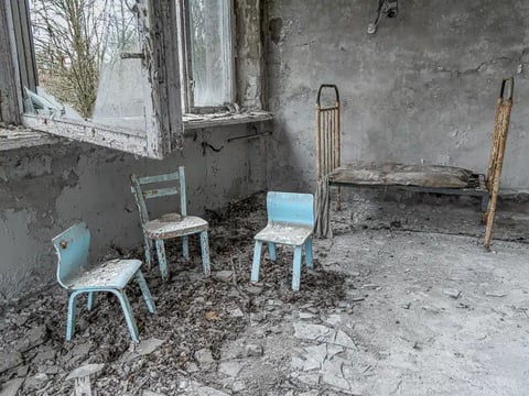 Beds, toys and children’s furniture remaining in the Prypiat hospital in Chernobyl.