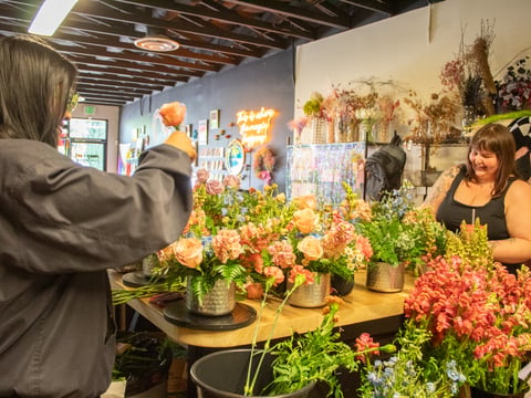 Ashley Singh (left) and Anna Gonzalez make floral arrangements Tuesday, May 6, 2025, at Poppy and Pot at 2908 Franklin Blvd in Sacramento.