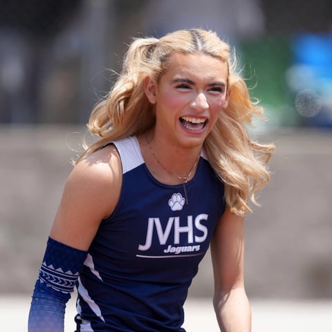 AB Hernandez of Jurupa Valley smiles while completing in the girls long jump during the CIF Southern Section Masters Meet at Moorpark High School, Saturday, May 24, 2025, in Moorpark, Calif.