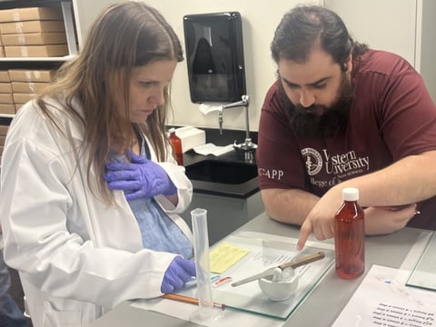 Joanne Scott, left, practices pharmaceutical compounding, part of Mt. San Antonio College's short-term vocational pharmaceutical technician program.