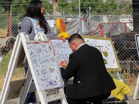 Family members of Jhony and Jesus Ramos put up signs asking for justice Monday, July 7, 2025, in Esparto.