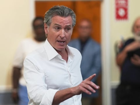 Gov. Gavin Newsom, R-Calif., speaks to a crowd gathered at an event space during a two-day swing through South Carolina on Tuesday, July 8, 2025, in Bennettsville, S.C. (AP Photo/Meg Kinnard)