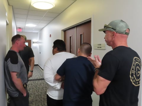 Four ICE agents arrest a Guatemalan asylum seeker Tuesday, July 8, 2025, outside a Sacramento immigration courtroom at the John E. Moss Federal Building in downtown Sacramento.