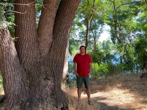 Joshua Thomas is with American River Trees, a group fighting to preserve trees along the riverbank near Watt Avenue. The Army Corps of Engineers is proposing to remove hundreds of trees as part of a project to reinforce the levee. June 10, 2025