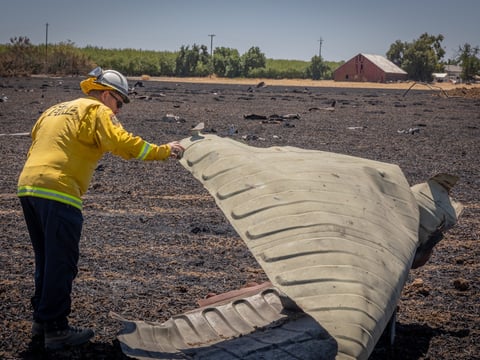 Cal Fire investigates the scene of the July 1 explosion at a fireworks facility in Esparto. July 8, 2025.