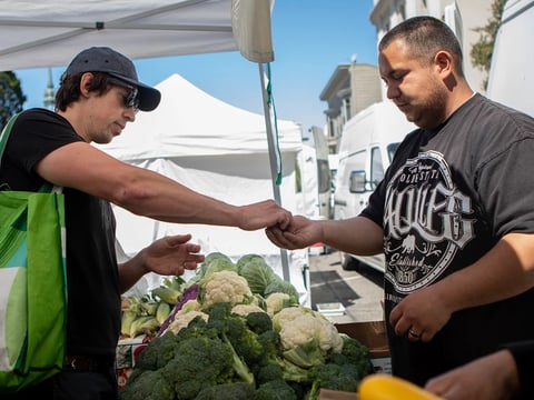 The Ecology Center farmers' market in downtown Berkeley on July 13, 2019. CalFresh participants can purchase tokens at the market using their benefits card and can receive up to $10 in additional tokens specifically for fruits and vegetables.