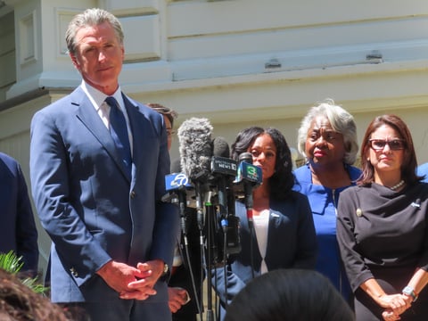 California Governor Gavin Newsom is joined by Democrats in the Texas state legislature Friday, July 25, 2025, outside the Governor's Mansion in Sacramento.