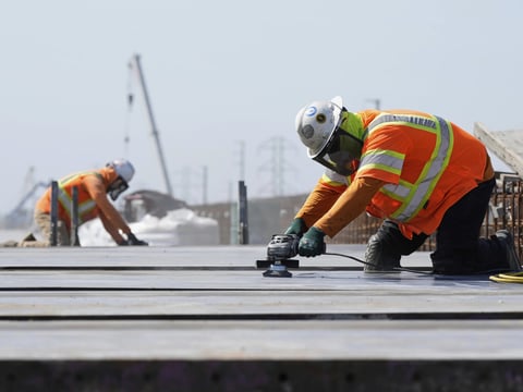 Ironworkers with the California High-Speed Rail Authority work on the Hanford Viaduct, Tuesday, April 15, 2025, in Kings County, Calif.