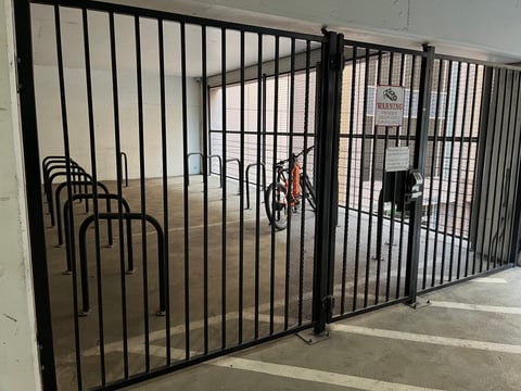 A bike cage Thursday, Aug. 7, 2025, in the Sacramento Central Public Library parking lot at 828 I St. The cage provides secure long-term bike parking.