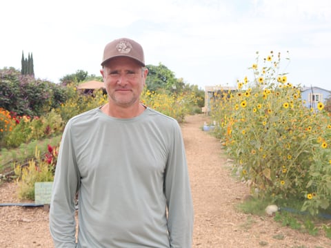 Shawn Harrison, the founder and co-director of Soil Born Farm and education project, stands in the garden of the farm at the American River Ranch in Rancho Cordova.