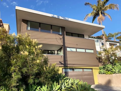The Fortunatos' Green Idea House in Hermosa Beach, Calif., has a flat roof with a 5-foot overhang that shields the sun and cools the home.