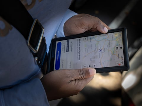 Federal employees like Sharon W. impacted by the government shutdown look for means to financially support their families by taking to gig work like rideshare apps.