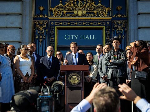 Mayor Daniel Lurie speaks at a press event in front of San Francisco City Hall on Oct. 29, 2025.