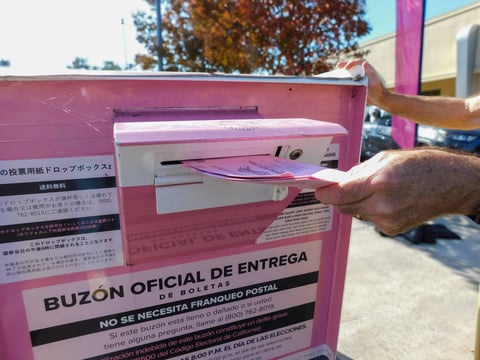 A ballot being dropped off at the drive-through drop box in the Elections Office parking lot at 7000 65th Street, Sacramento, Thursday, Oct. 23, 2025.