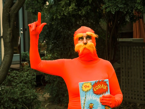 Environmental Activist Megan Elsea poses for a photo outside her home in Sacramento as her alter ego the Lorax, a costume she has been using to advocate against projects that she says cause harm to the Sacramento landscape.