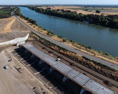 A drone view of the Sacramento Weir Expansion Project by the US Army Corps of Engineers near Lower Elkhorn Basin Levee Setback Project (LEBLS) expansion of the Yolo Bypass in Yolo County, California. Photo August 25, 2025.