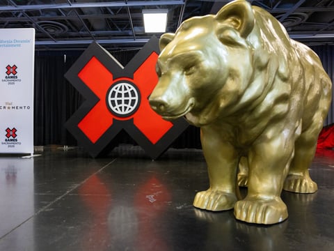 The California golden bear stands in front of the X Games display as organizers announce the games would be held at Cal Expo in Sacramento for at least three years starting in 2025 though the event was eventually postponed to 2026. Dec. 12, 2024.